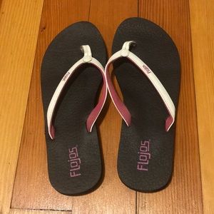 Black, Pink, & White Flip Flops.